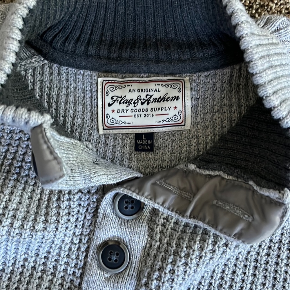 Gray cable-knit sweater